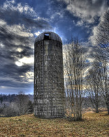 SIlo near an abandoned home